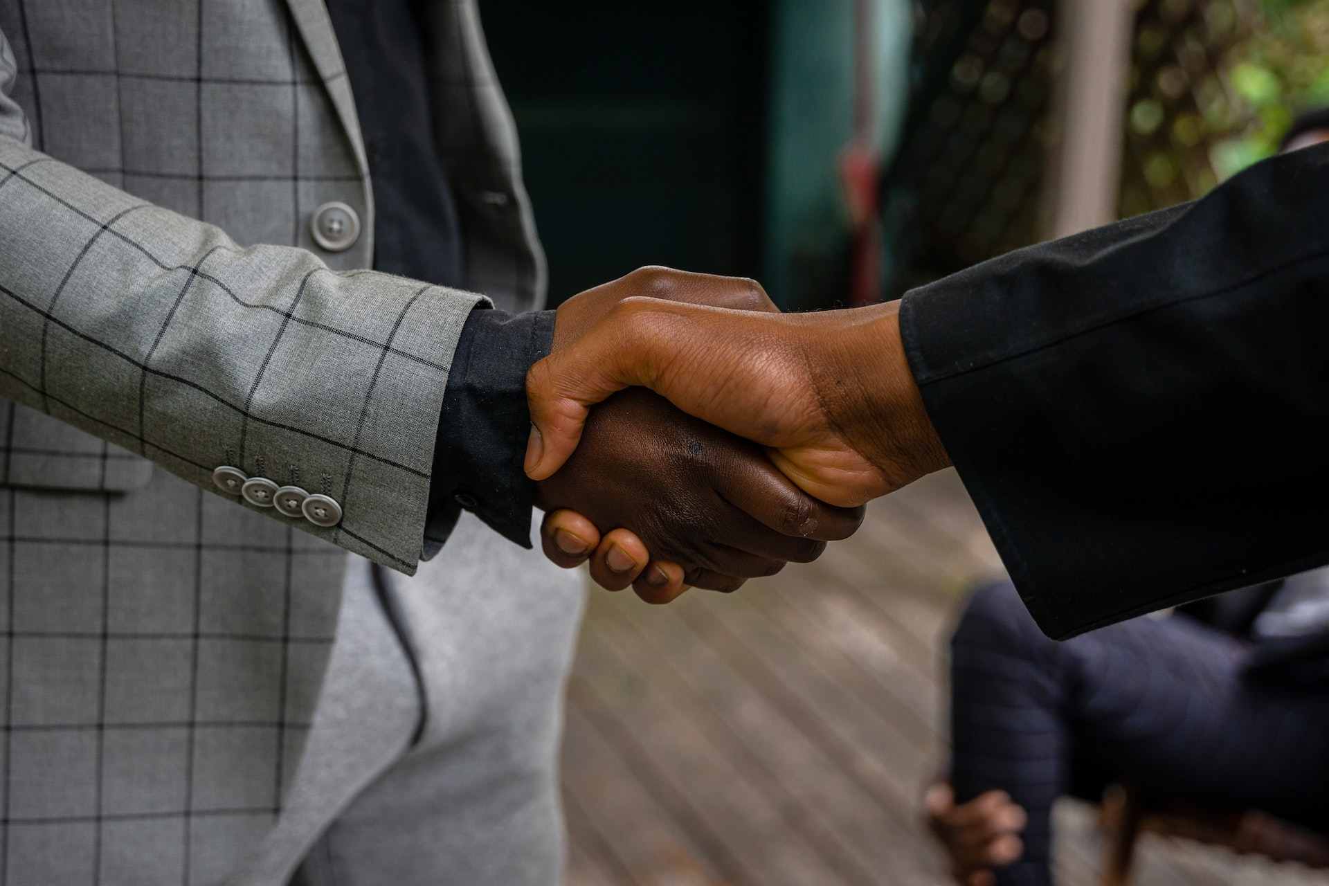 Shaking hands with prospective employer after job offer